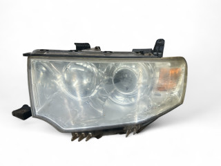 фара левая Mitsubishi L200 4 поколение 2010, 2.5 л., DiD, 4D56 (16V), дизель, 5МКПП, pyreness black / x08, пикап, полный привод, правый руль, 8301C031