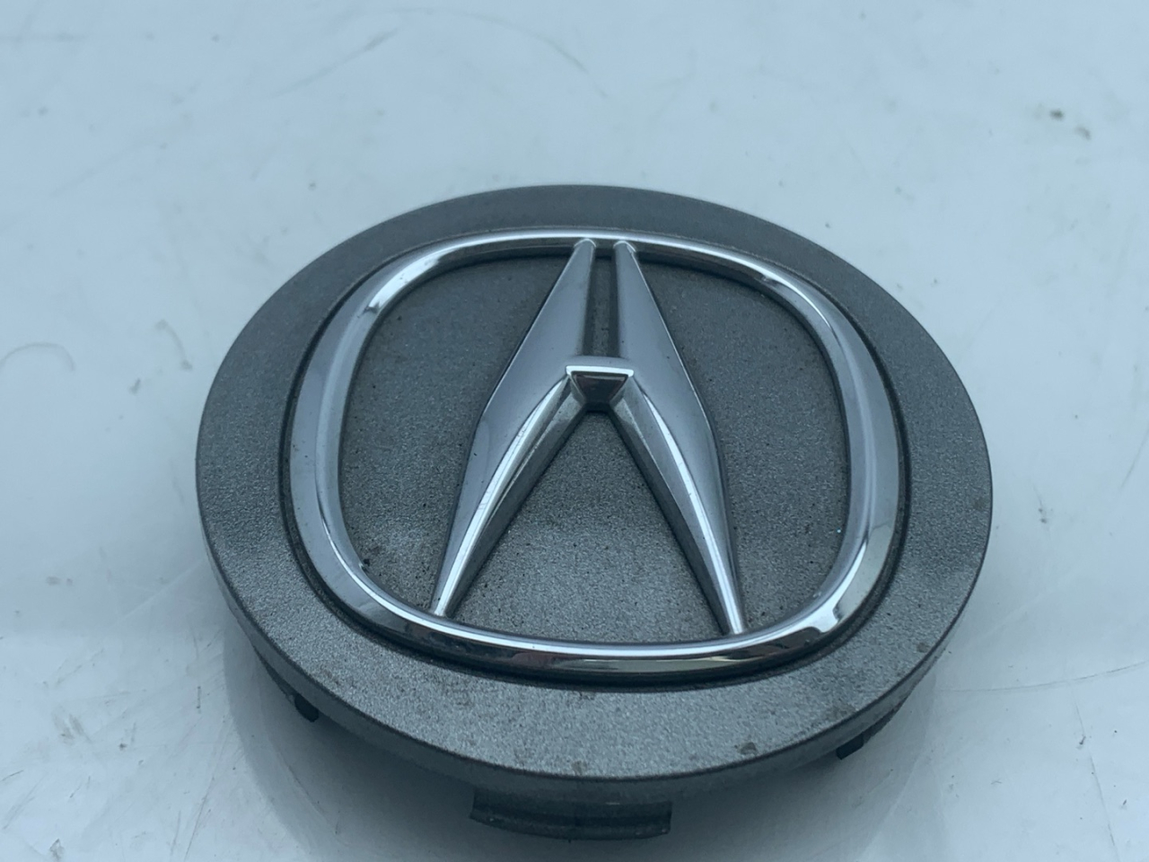 колпачок литого диска Acura RDX 3 поколение 2020, 2.0 л., бензин, АКПП, белый, внедорожник 5 дв., полный привод - фото №1