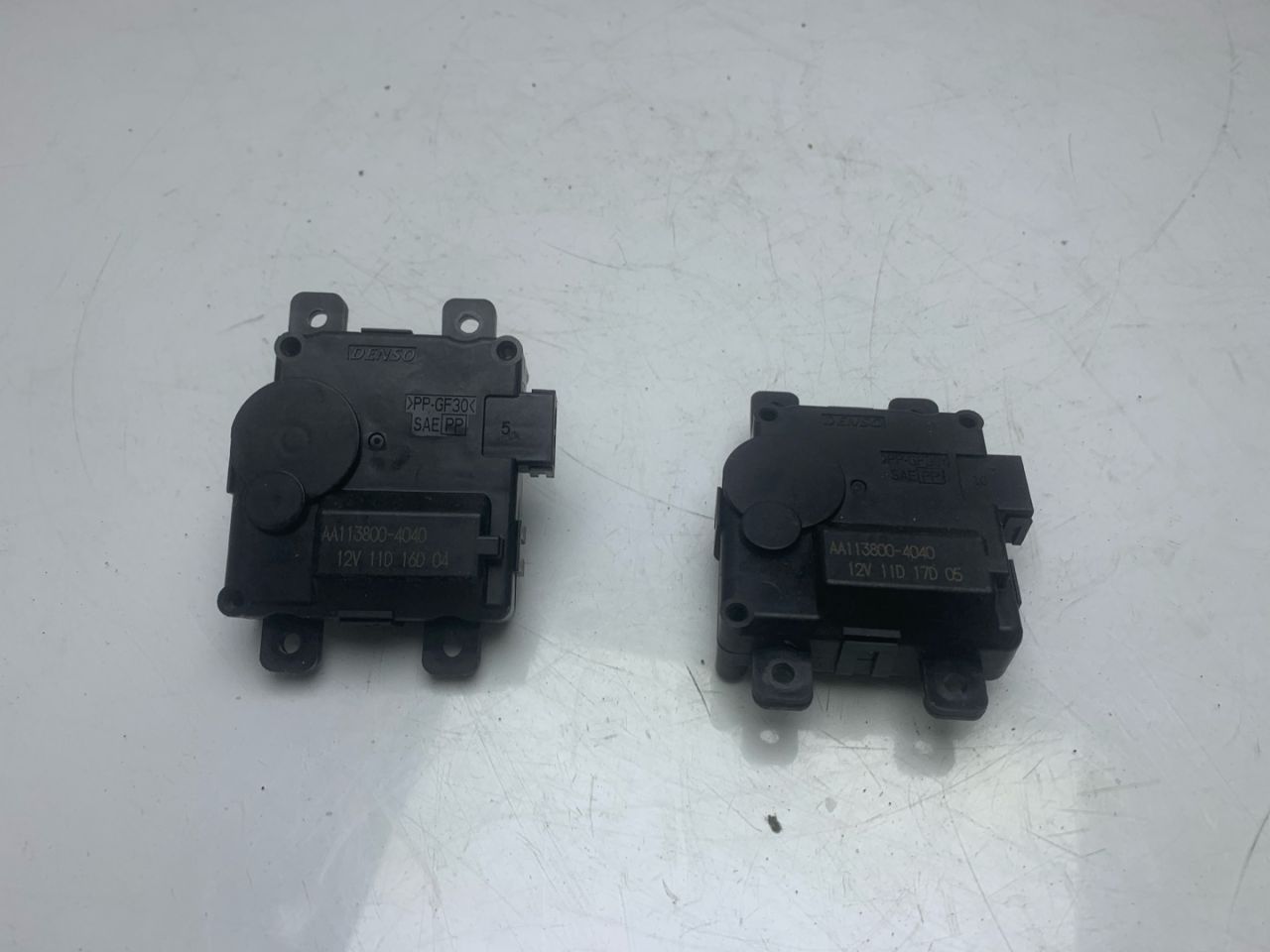 моторчик заслонки печки Acura TLX 3-е поколение 2021, 2.0 л., бензин, АКПП, серый, передний привод, AA1138004040 - фото №1