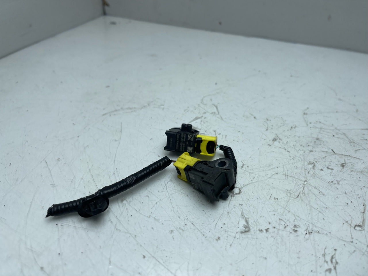 датчик удара Acura RDX 3 поколение 2020, 2.0 л., бензин, АКПП, белый, внедорожник 5 дв., полный привод, 77970TVAC010M4, 77930TJBA011M4 - фото №1