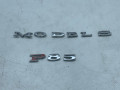 эмблема Tesla Model S 1 поколение (2012 - 2016), 0.1 л., электро, АКПП, серый, седан, задний привод - фото №3