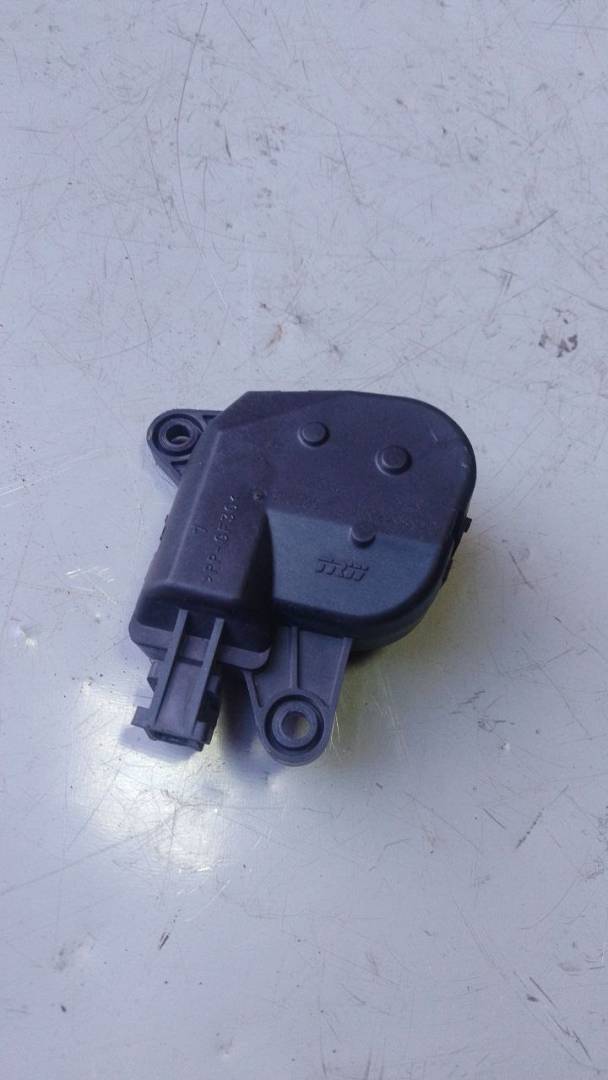 моторчик заслонки печки Dodge Caravan 4 поколение (2000 - 2007), 04885465AA - фото №1