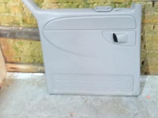обшивка двери задняя левая Dodge Caravan 4 поколение (2000 - 2007), 0WL911D5AD, C6509880