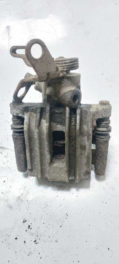 суппорт задний правый Volkswagen Golf 5 поколение (2003 - 2009), 1K0615424M - фото №1