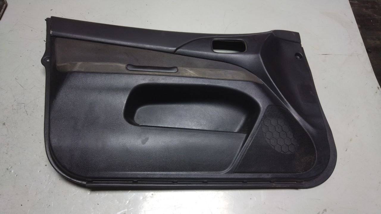 обшивка двери передняя левая Mitsubishi Lancer 9 поколение (2003 - 2010) - фото №1