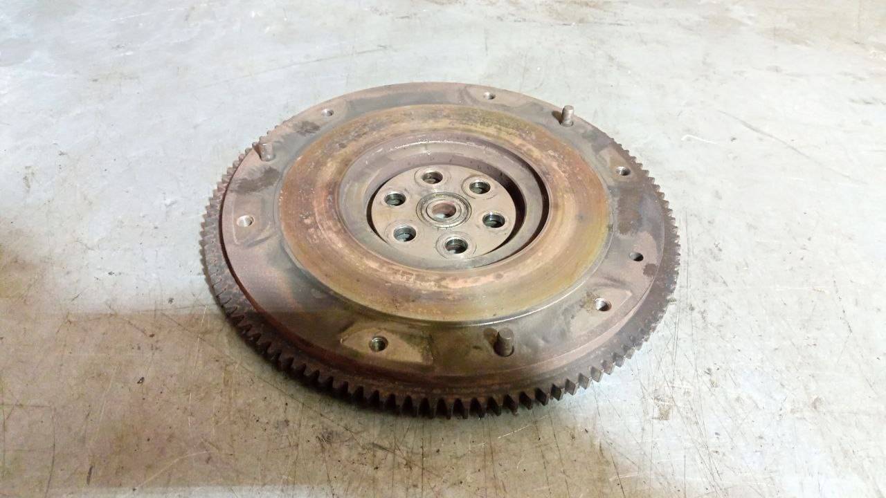 маховик Mazda 323 6 поколение (1998 - 2001), 1.6 л., бензин, МКПП - фото №1