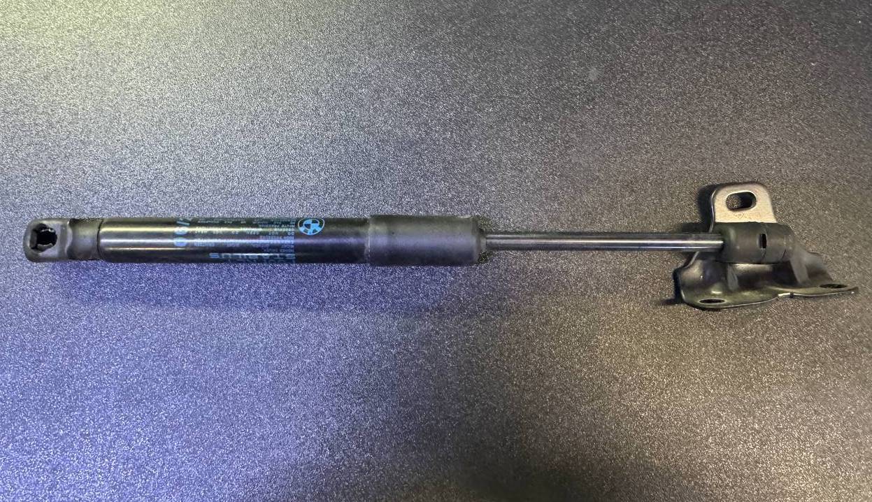 амортизатор капота Mini Cooper 3 поколение (2013 - 2018), 51237300567, 7300567, 51237300580, 7300580 - фото №1