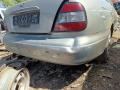 бампер задний Daewoo Leganza 1 поколение V100 2000, 1.8 л., бензин, АКПП, седан - фото №2