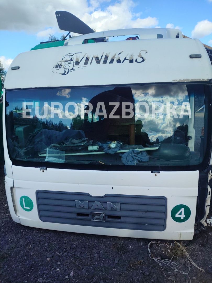 кабина MAN TGA 1 поколение (2000 - 2008) - фото №1