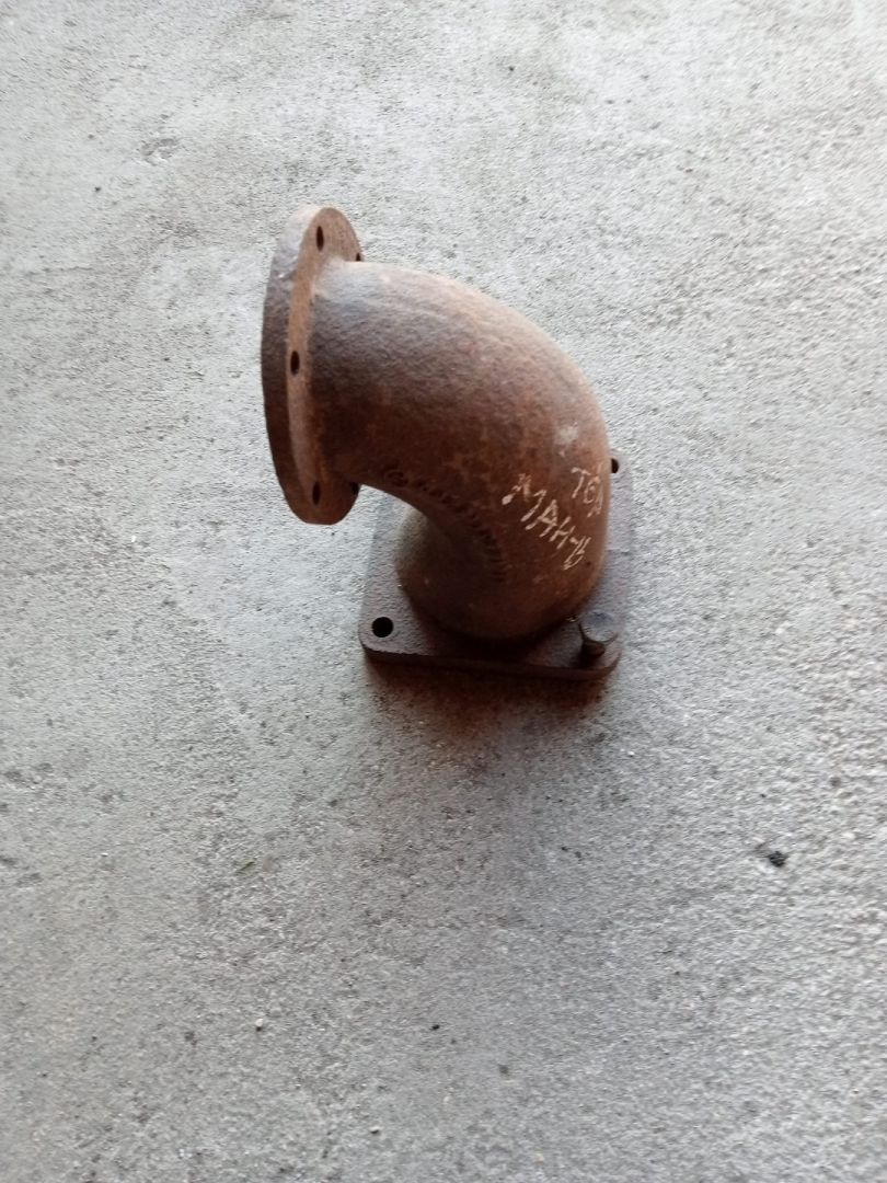 Колено турбины (чугунное) MAN TGA 1 поколение (2000 - 2008) - фото №1