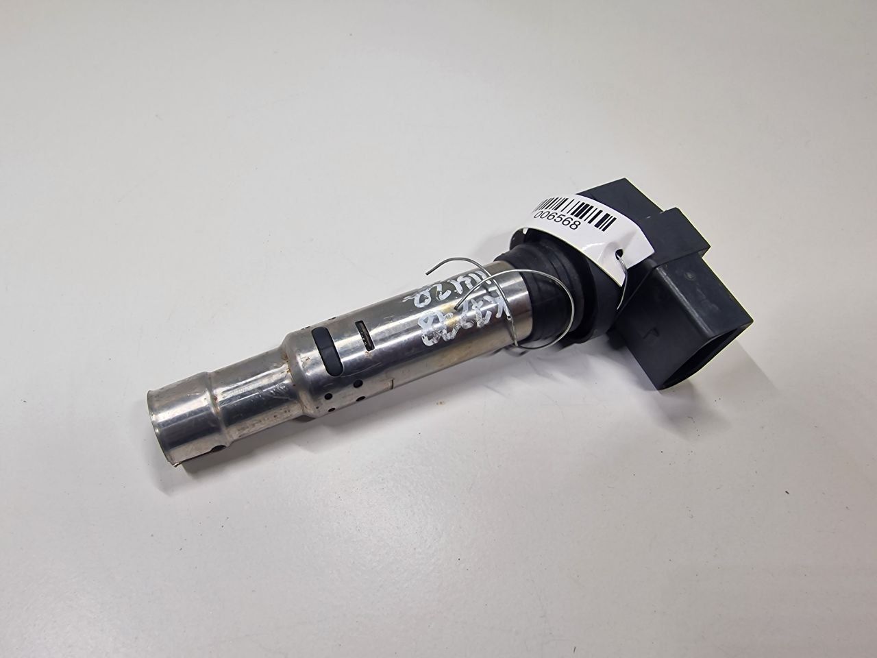 катушка зажигания SEAT Ibiza 4 поколение 2009, 1.4 л., i, бензин, МКПП, передний привод, 036905715F - фото №1