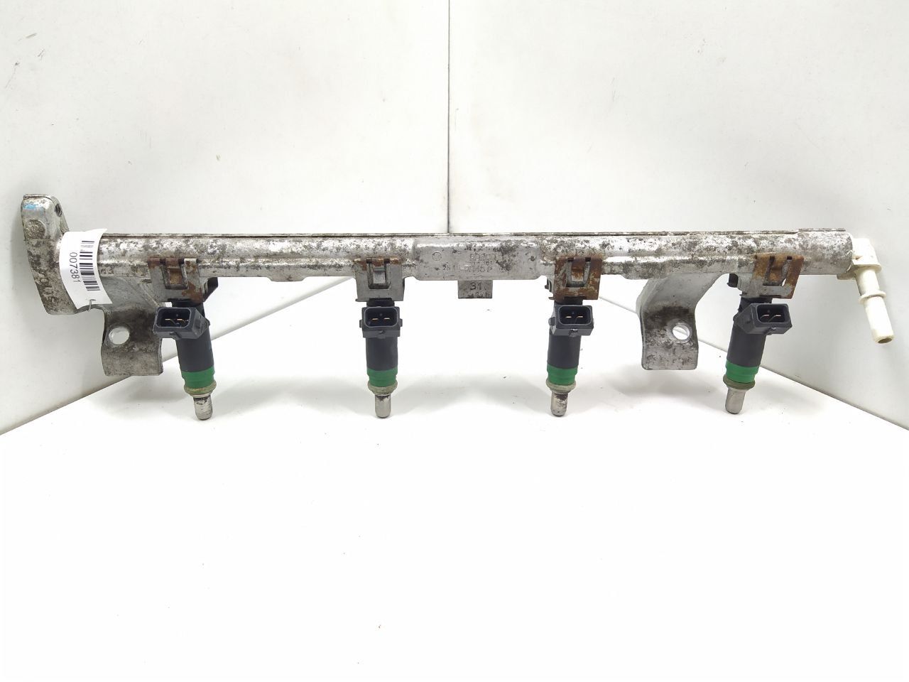 форсунка Ford Fusion 1 поколение 2004, 1.6 л., i, бензин, МКПП, передний привод, 98MFBB9F593 - фото №1