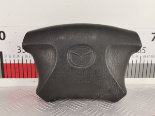 подушка безопасности водителя Mazda 323 6 поколение 1998, 2.0 л., МКПП, хетчбэк 5 дв., NC1057K00B00
