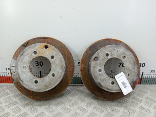 диск тормозной задний Mitsubishi Lancer 10 поколение 2008, 1.8 л., АКПП, хетчбэк 5 дв.