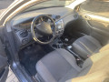 дверь передняя левая Ford Focus 1 поколение [рестайлинг] 2002, 1.4 л., МКПП, хетчбэк 3 дв., 1430144 - фото №11