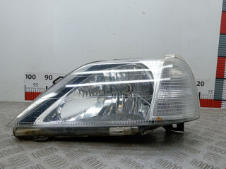 фара левая Renault Logan 1 поколение 2009, 1.5 л., МКПП, фургон, 8200211005