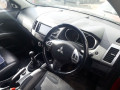 магнитола Mitsubishi Outlander 2 поколение 2007, 2.2 л., МКПП, внедорожник 5 дв., 8750A143 - фото №11