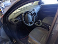 шторка багажника Ford Focus 2 поколение 2005, 1.4 л., МКПП, универсал, 1372227 - фото №10