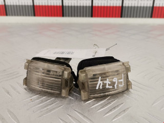 подсветка номера Mazda 2 1 поколение DY 2003, 1.4 л., МКПП, хетчбэк 5 дв., D35051270E