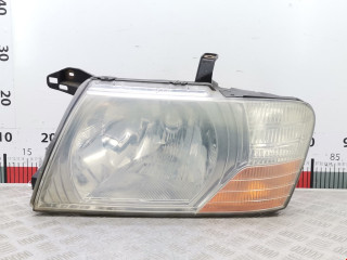 фара левая Mitsubishi Pajero 3 поколение 2002, 3.2 л., АКПП, внедорожник 5 дв., MN117105