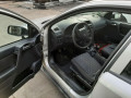 магнитола Opel Astra G 1999, 2.0 л., МКПП, хетчбэк 5 дв. - фото №13