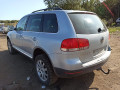 суппорт передний левый Volkswagen Touareg 1 поколение 2004, 2.5 л., АКПП, внедорожник 5 дв., 7H0615123C - фото №10