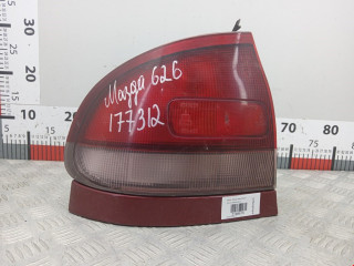 фонарь задний левый Mazda 626 GE [рестайлинг] 1995, 1.8 л., МКПП, хетчбэк 5 дв.