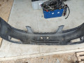 бампер передний Toyota Corolla 9 поколение (E120/E130) 2002, 1.4 л., 4ZZ-FE, бензин, МКПП, хетчбэк 5 дв. - фото №10