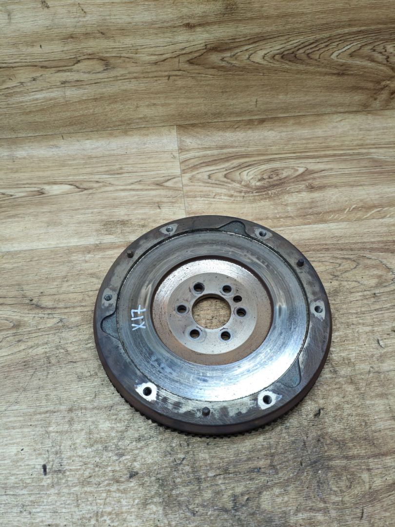 маховик Peugeot 208 1 поколение 2012, 1.2 л., бензин, МКПП, хетчбэк 3 дв., 9674033680 - фото №1