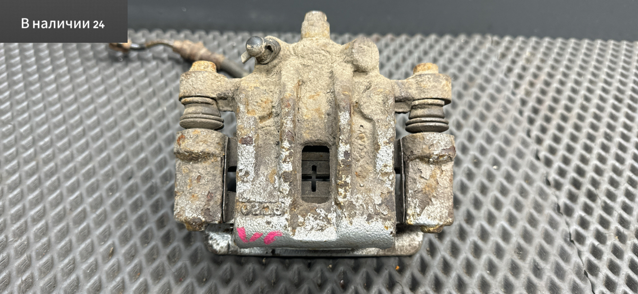 суппорт задний левый Kia Cerato 2 поколение TD 2009, 1.6 л., G4FC, бензин, МКПП, cеребро 3d - bright silver, седан, передний привод, 583101MA00, 582101M300 - фото №1