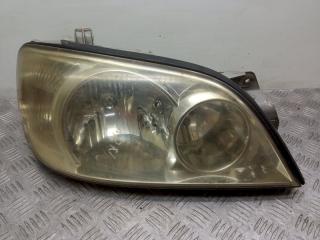 фара правая Kia Carnival UP/GQ [рестайлинг] 2002