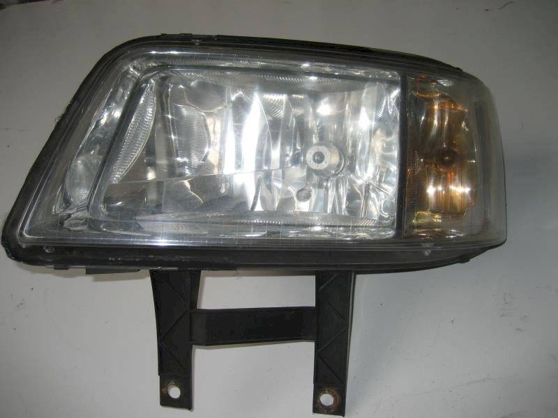 фара левая Volkswagen Transporter T5 2006 - фото №1