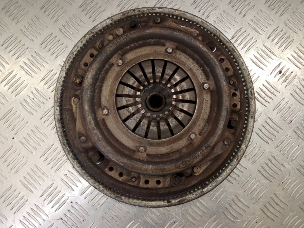 маховик Ford Fiesta 5 поколение 2005, 1.4 л., i, XS6E-6338-AA - фото №1