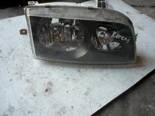 фара левая Kia Carens 2 поколение 2007