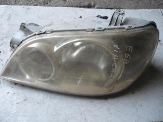 фара левая Kia Carnival UP/GQ [рестайлинг] 2001