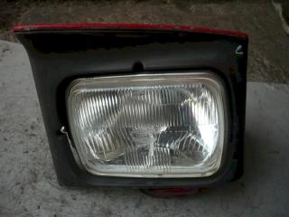 фара левая Mazda 323F BA 1994