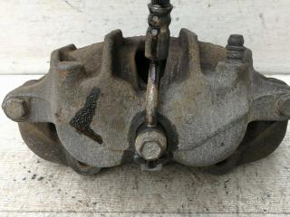 суппорт передний левый Nissan Terrano II R20 [2-й рестайлинг] 2003