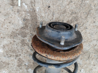 стойка передняя левая Mitsubishi Carisma 1 поколение 1997, 1.8 л., бензин, МКПП