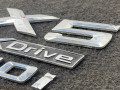 эмблема BMW X5 G05 [рестайлинг] 2023 - фото №3