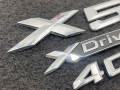 эмблема BMW X5 G05 [рестайлинг] 2023 - фото №2