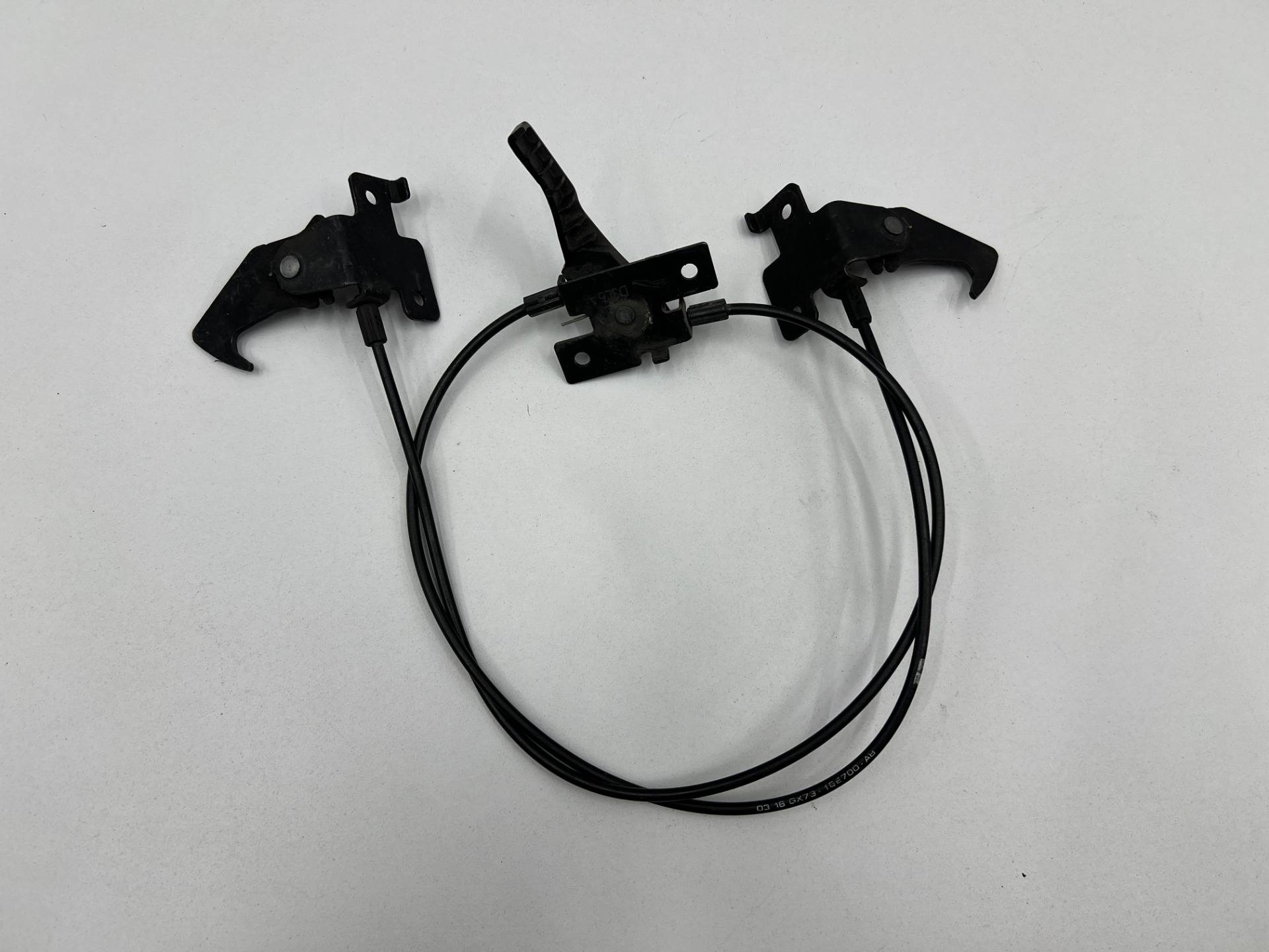 Трос капота Jaguar XE X760 2016 OEM DK6216892AE, DK6216B766AE, GX7316E700AB, T2H24630, T2H2999, T2H41038, T2H41039, T4N3060, T4N3061, T4N3064