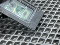 подсветка номера Jaguar XE 1 поколение 2017, 3.0 л., AJ 126, бензин, АКПП, седан, GX7313B627AB, T2H24328, T4N3071, LR087728, LR067243 - фото №11