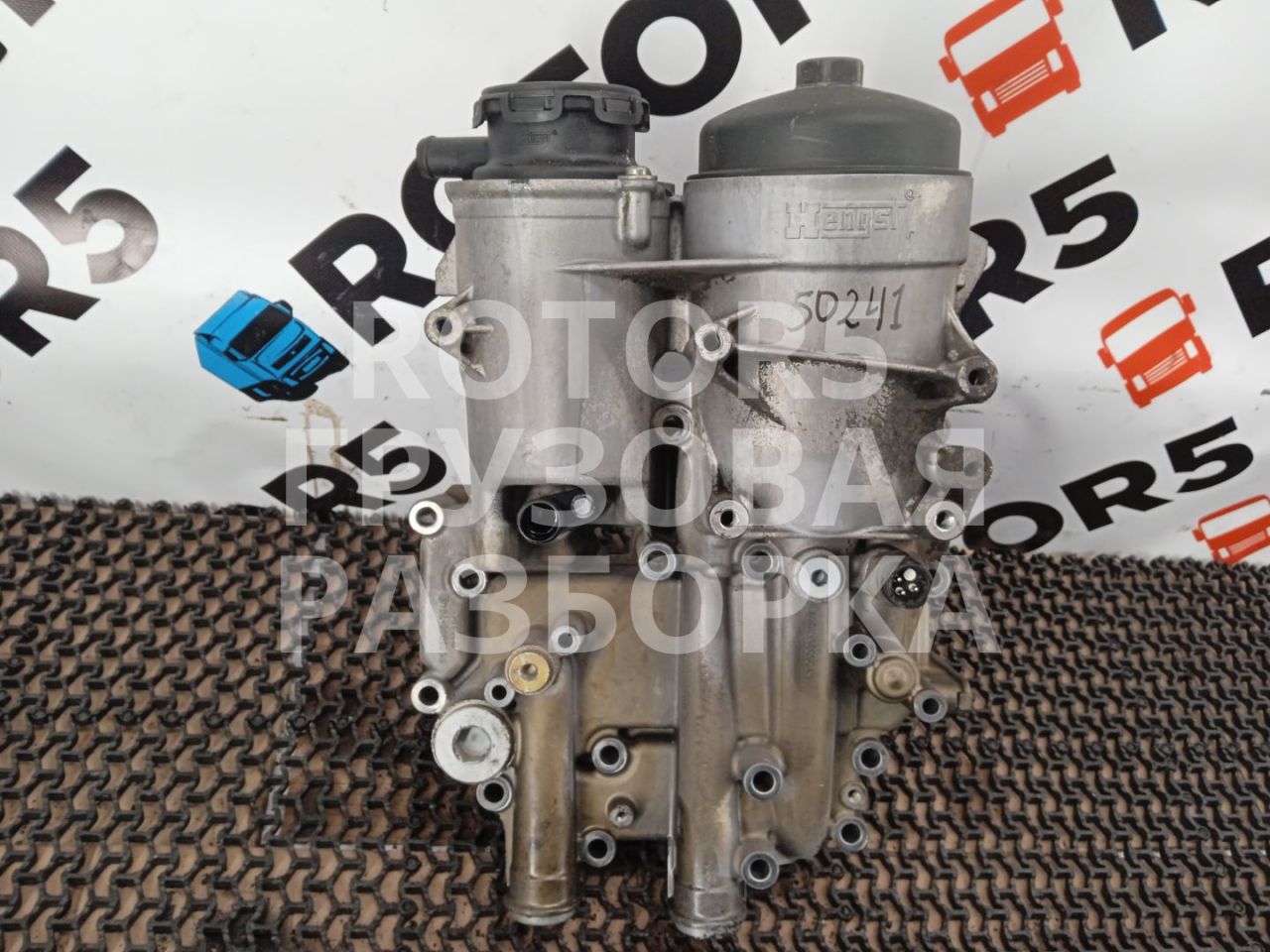 корпус масляного фильтра MAN TGA 1 поколение 2007, 10.5 л., D 2066 LF 01, дизель, 5105000704 - фото №1