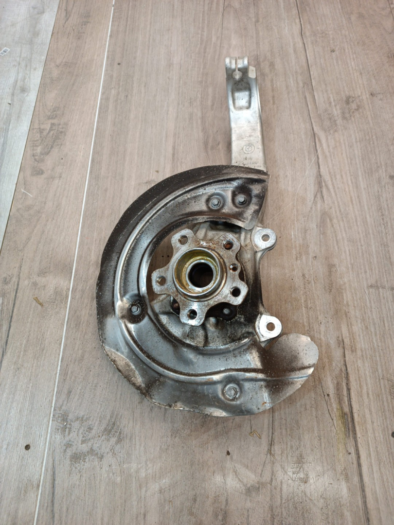 кулак поворотный левый BMW X5 G05 2022, 3.0 л., B58B30C, бензин, АКПП, c27, внедорожник 5 дв., полный привод, 31216876655, 6876655, 6864571 - фото №1