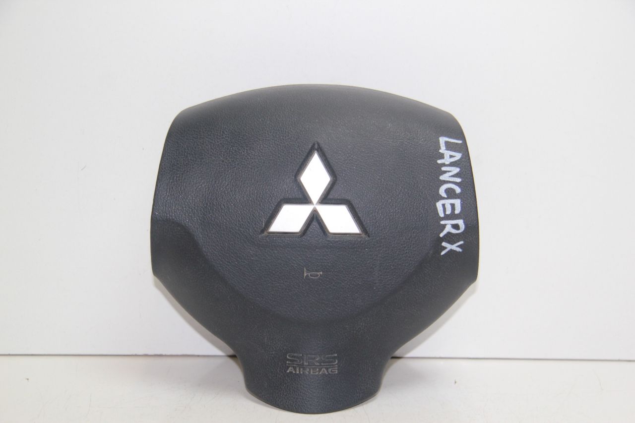 подушка безопасности водителя Mitsubishi Lancer 10 поколение CY2A 2008, 1.5 л., 4A91, бензин, АКПП, темно-серый, седан, передний привод, 7030A105XA - фото №1