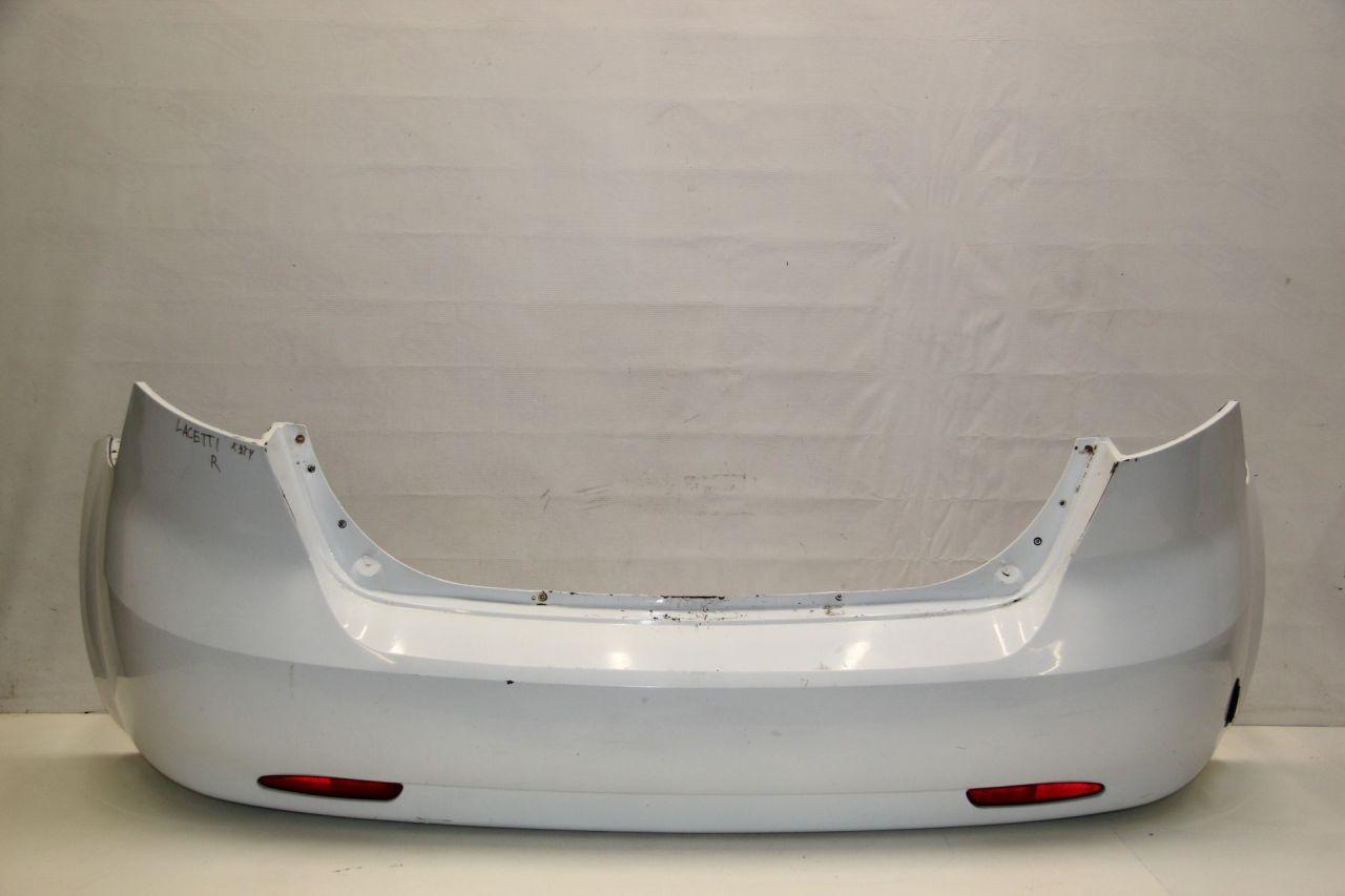 бампер задний Chevrolet Lacetti 1 поколение J200 2008, 1.4 л., F14D3, бензин, МКПП, белый, хетчбэк 5 дв., передний привод, 96545556 - фото №1