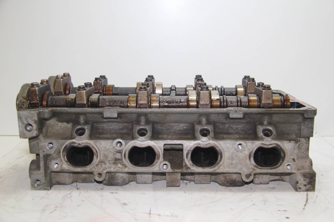 головка блока цилиндров Ford Focus 2 поколение CB4 2007, 1.4 л., ASDA, бензин, МКПП, черный, хетчбэк 5 дв., 4M5G6090ZB - фото №1