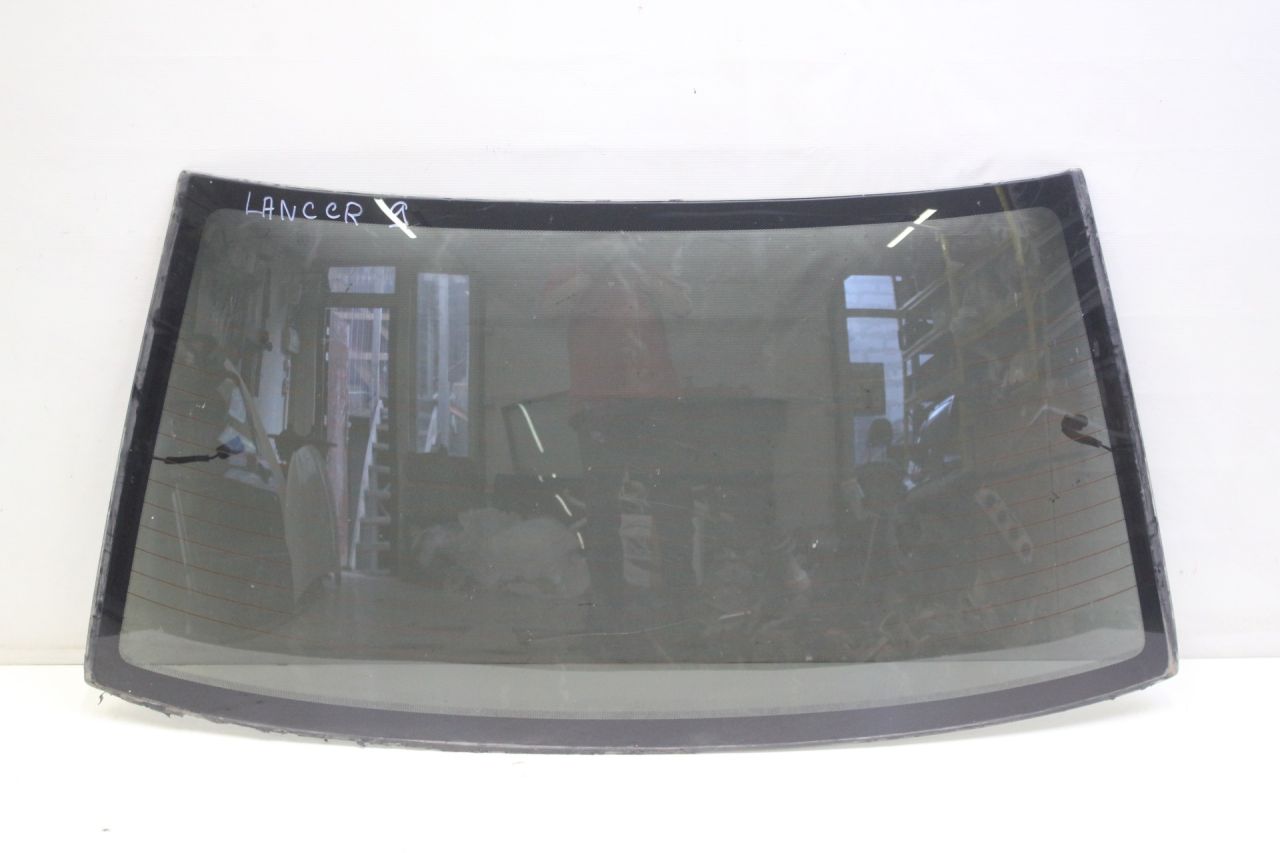 стекло заднее Mitsubishi Lancer 9 поколение CS9A 2006, 2.0 л., 4G63 (DOHC 16V), бензин, АКПП, черный, седан, передний привод - фото №1