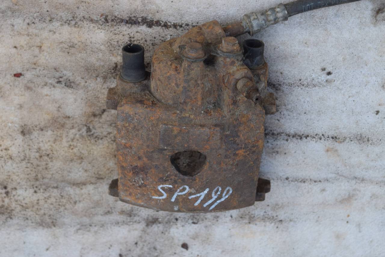 суппорт передний левый Volkswagen Polo 3 поколение 1998, 1.4 л., бензин - фото №1