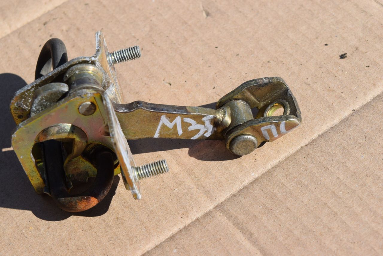 ограничитель открывания двери Volvo XC70 1 поколение 1999, 2.4 л., Ti, B 5244 T, бензин, АКПП, универсал, полный подключаемый привод, 9203196 - фото №1